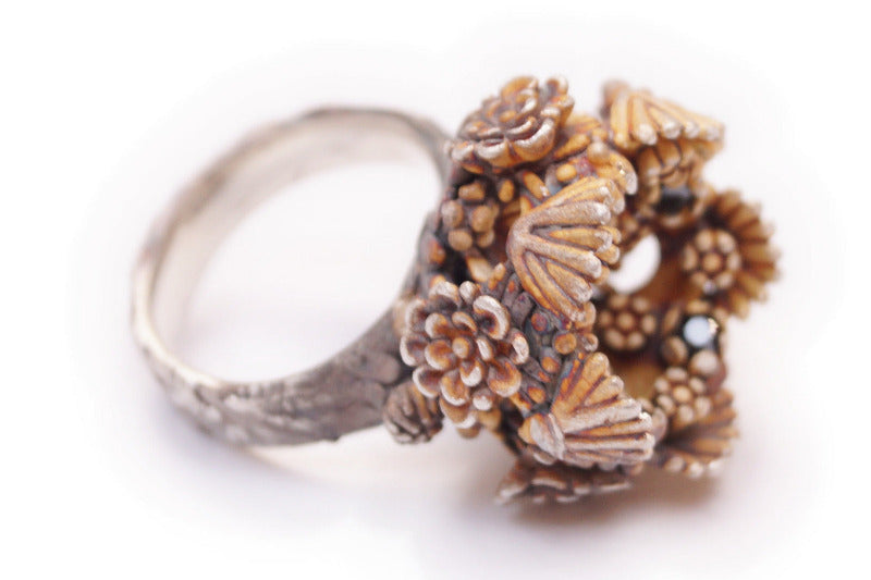 Handmade Symmetrical statement ring in recycled 925 sterling silver with floral and botanical details and five black cubic zirconia stones