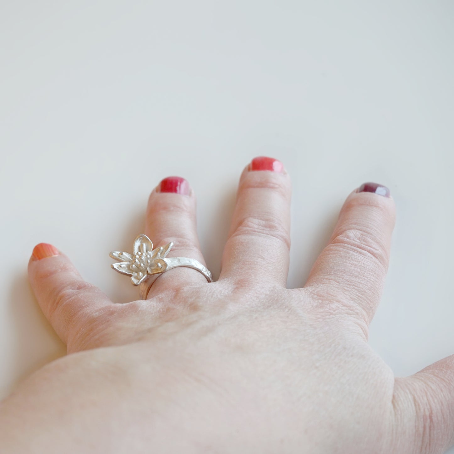 Silver Ring with Large Flower | Unique Bloom Design - Sitting Between Fingers | Assymetrical