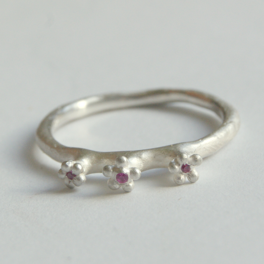 Cute Secret Garden Ring with three Tiny Flowers topped with Rubies